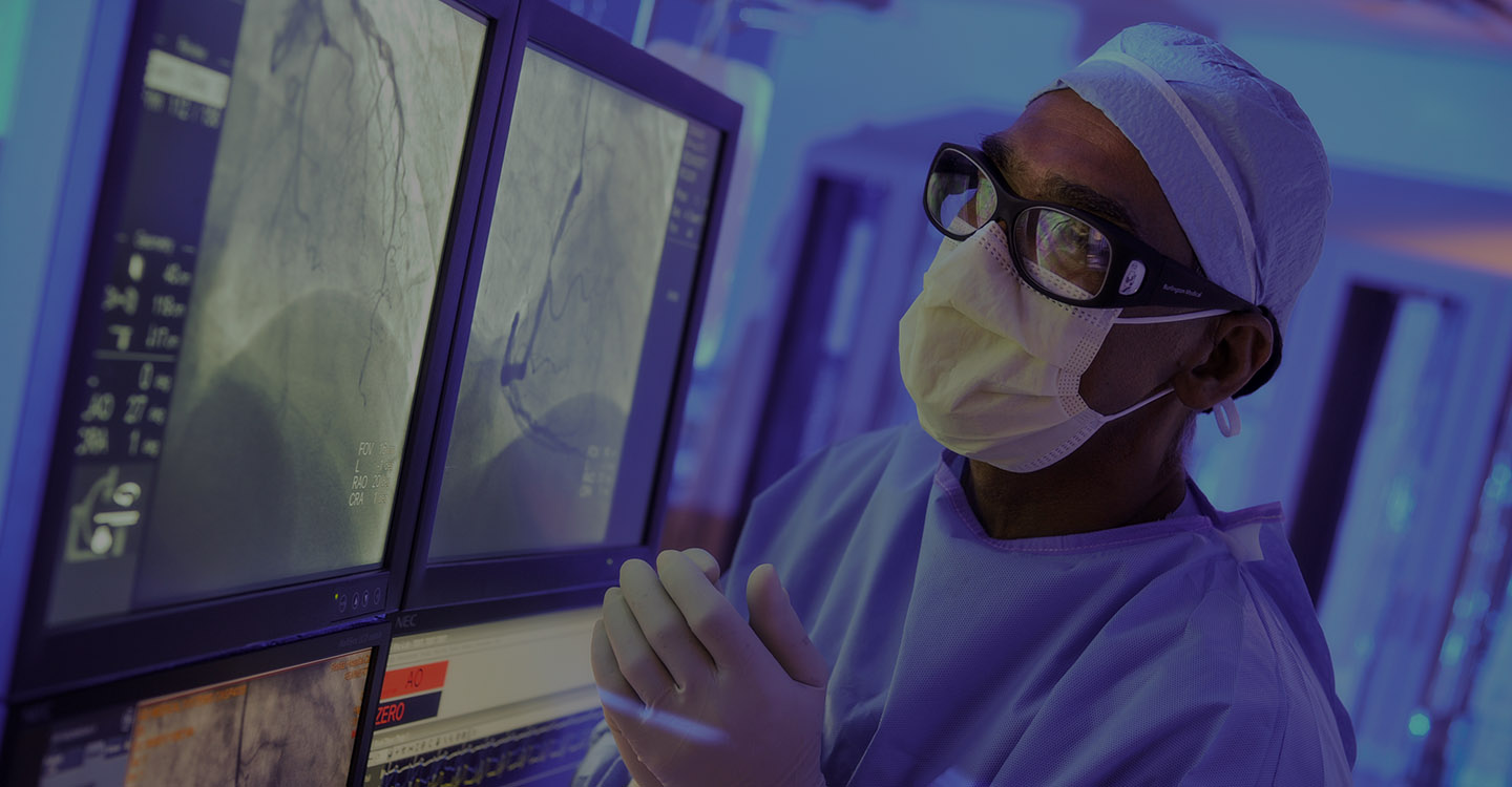 Neurologist doctor reviewing a neuro patients scan before brain surgery