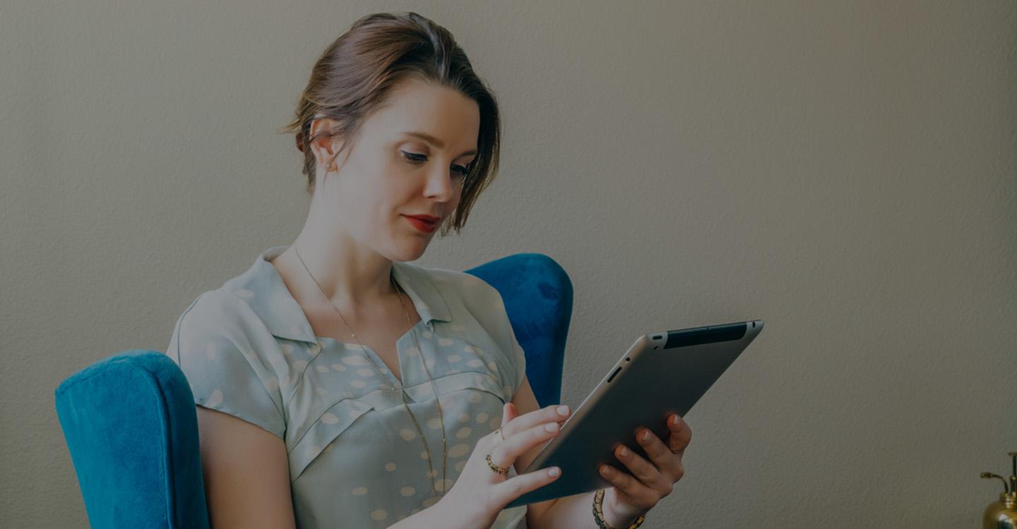 Neurology patient looking over neurological diseases on iPad