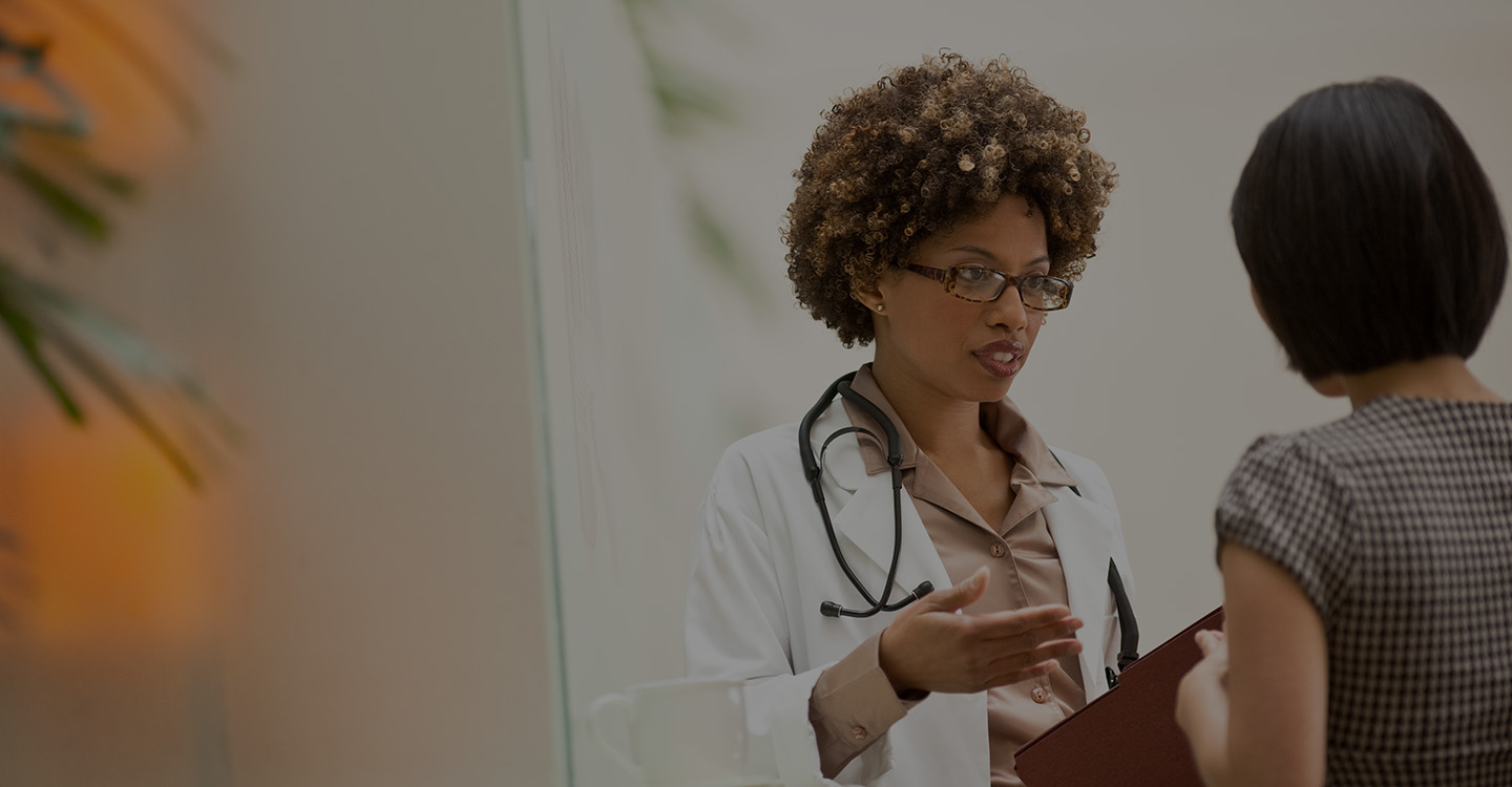 Brain doctor talking with patient