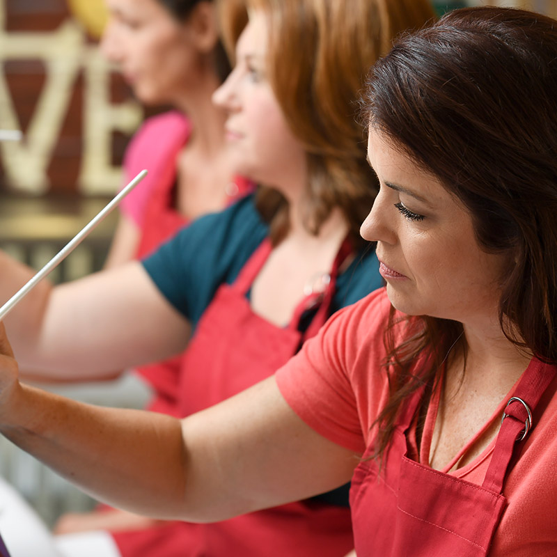 Woman painting to keep the brain active