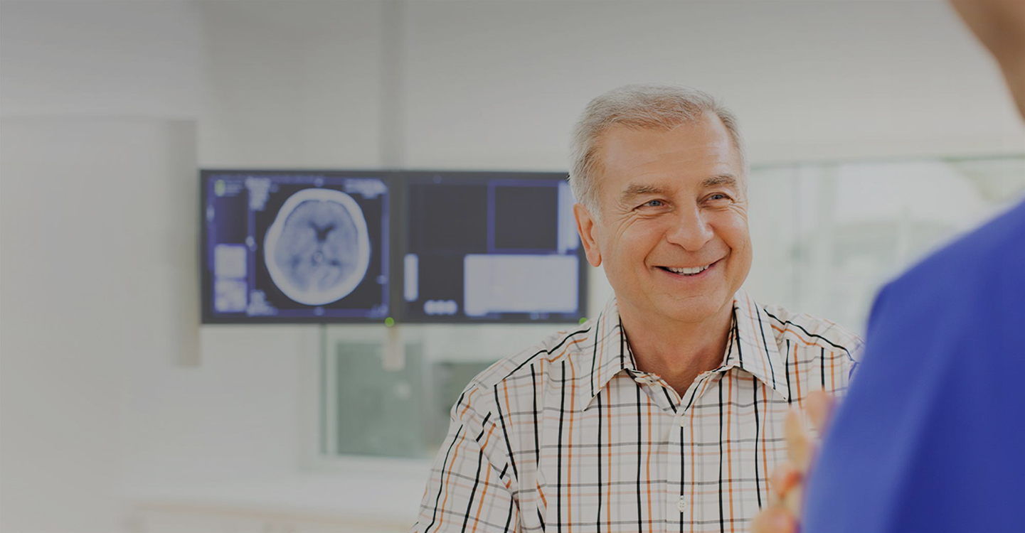 Patient talking with his doctor.