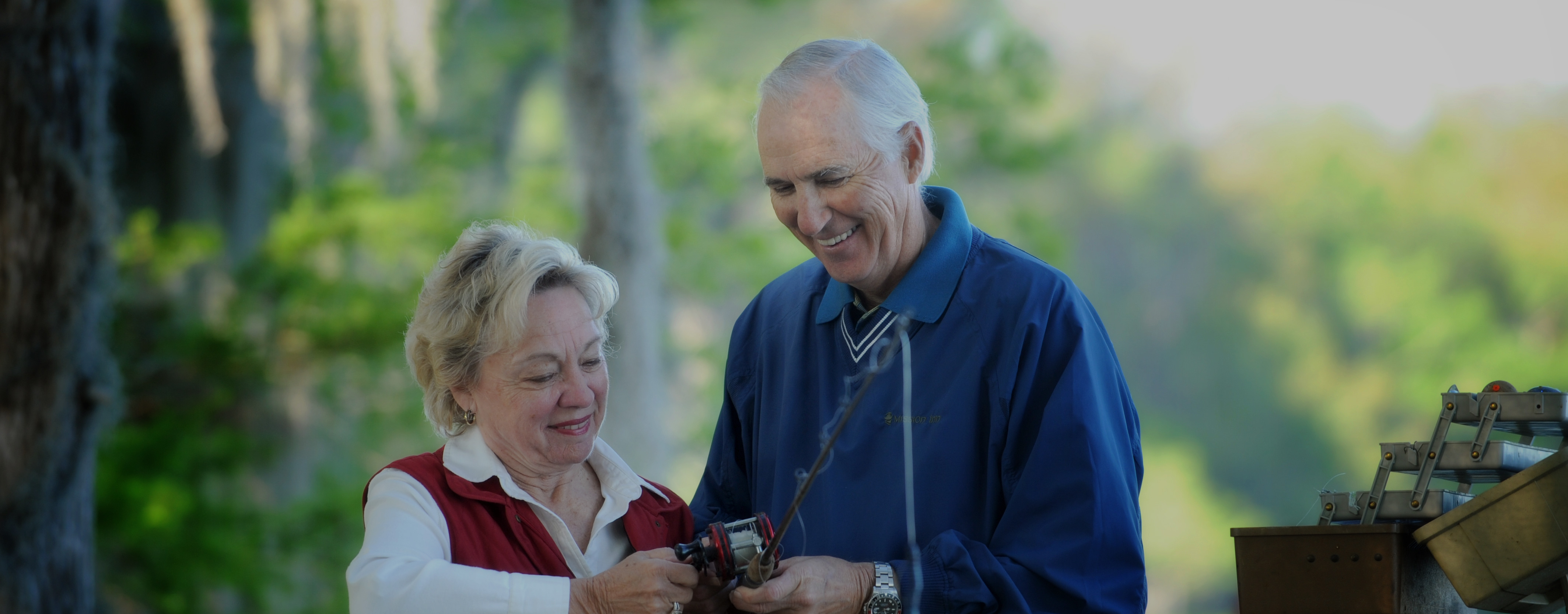 Older couple fishing together.