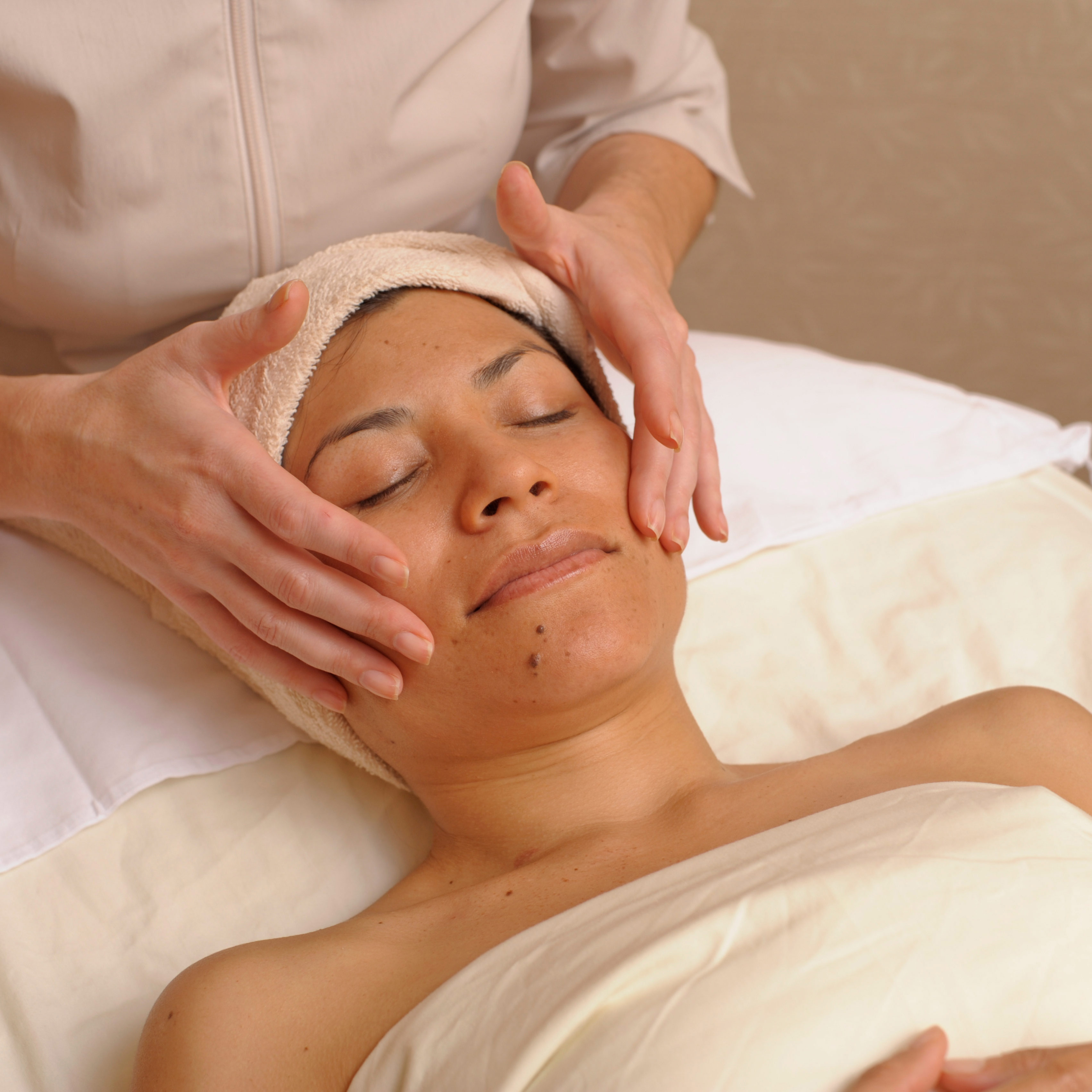 Woman getting a facial.