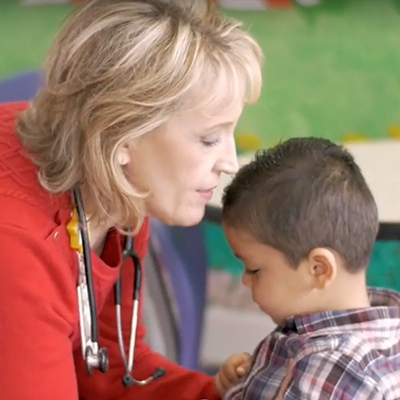 neurology doctor assessing child