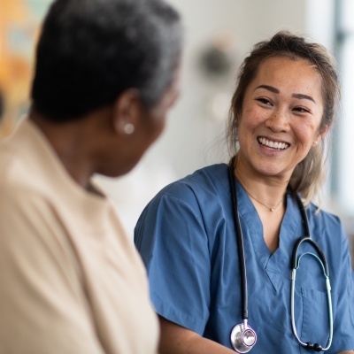 Doctor talks with patient.