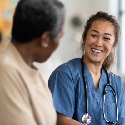 Patient talking with a doctor.