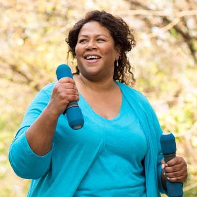 Woman outdoors exercising.